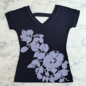 NWT. The Limited Stretch Short Sleeve V-Neck Blouse with Front Painted Flowers.